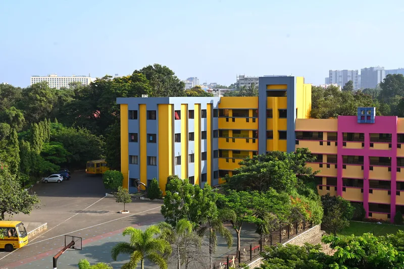 Aerial view of the St. Arnold’s Central School campus surrounded by trees