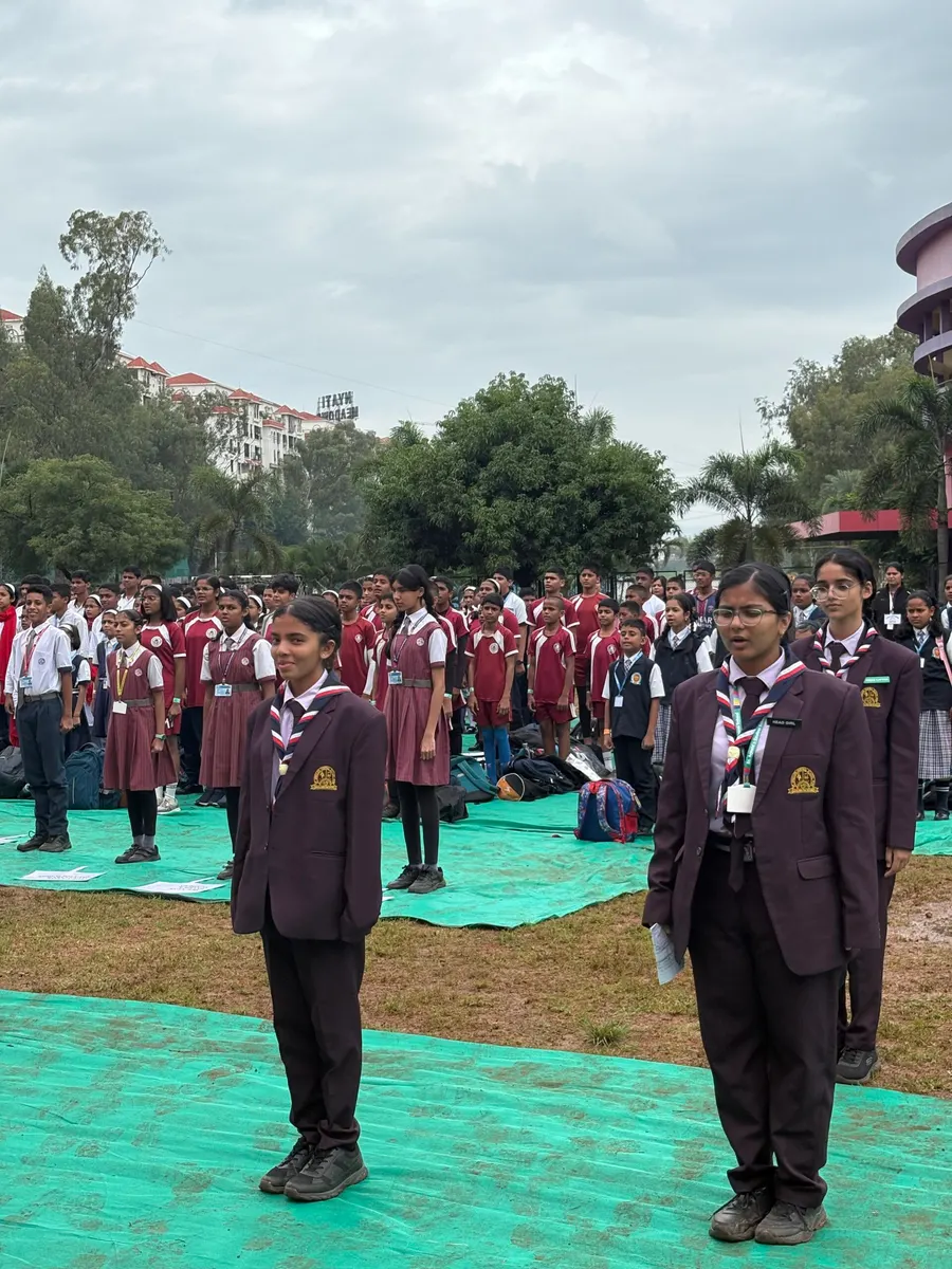 Students standing in formation during a formal school assembly parade