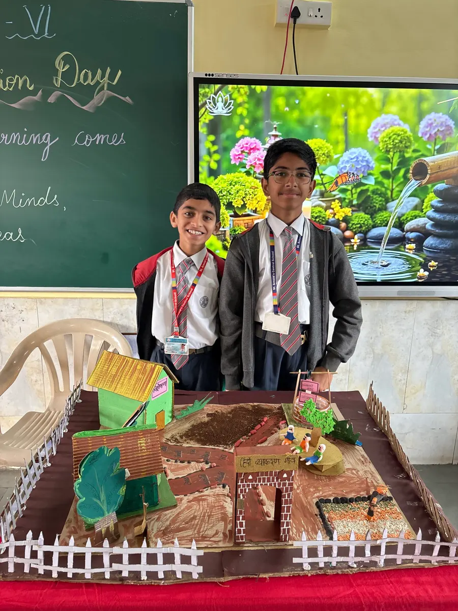Students presenting their classroom project model